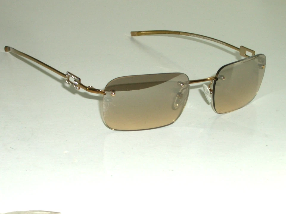 GAFAS DE SOL GUCCI ITALY GG1777/STRASS 51[]18-135 MARRÓN ELEGANTES RECTANGULARES SIN MONTURA Foto 2 de 4