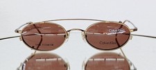 Vintage CALVIN KLEIN Eyeglasses CK516 053 w/ Sun Clip On 48-20 Titanium Brass