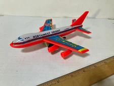 Northwest Orient Tin Litho Airplane Friction Toy Jumbo Boeing 747
