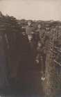 RPPC GERMANY SOLDIERS IN DUGOUT WW1 MILITARY REAL PHOTO POSTCARD (1917)