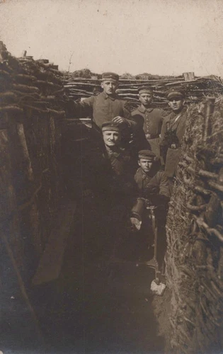 RPPC GERMANY SOLDIERS IN DUGOUT WW1 MILITARY REAL PHOTO POSTCARD (1917)