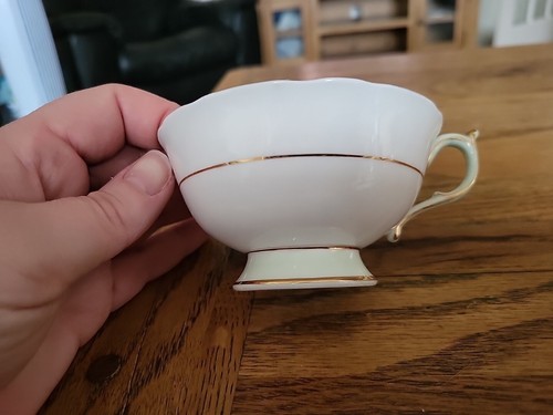 Coppa da tè Bone China Paragon FootedTeacup doppia garanzia - nero con interni in narciso - Foto 12 di 13