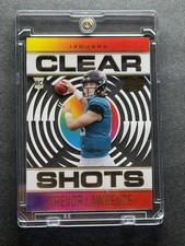 2021 Panini Illusions Clear Shots Acetate Trevor Lawrence Rookie Card #CS-16. rookie card picture