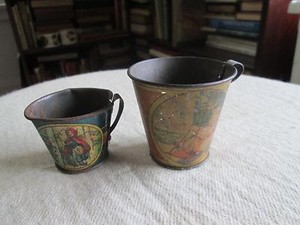 2 antique TIN PITCHERS CUPS Girl on Swing  Little Red Riding Hood