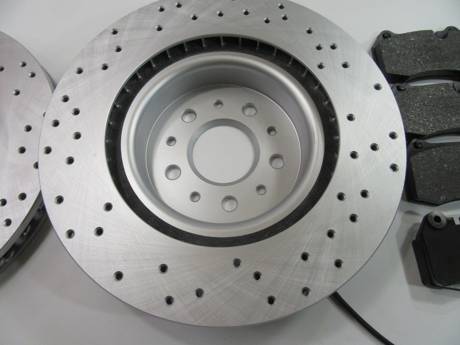 Maserati Quattroporte front brake pads & drilled rotors LOW DUST