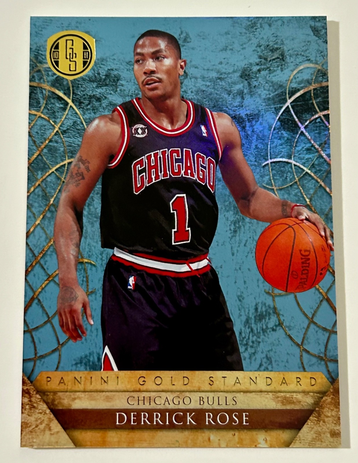 PLATINUM GOLD (Blue) #’d 23/25 2010-11 Derrick Rose MVP Panini Gold Standard #3