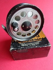 A BOXED J W YOUNG 3 1/2" PRIDEX LIGHTWEIGHT NARROW WIDTH FLY REEL