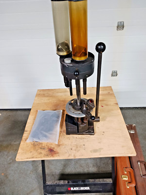 PONSNESS WARREN DUOMATIC 375 SHOTSHELL RELOADER, 20 GAUGE #7 & Set of Bushings