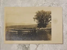 Vintage 1901-07 RPPC Postcard: Old Wood Fence and Mountian Vista in Distance