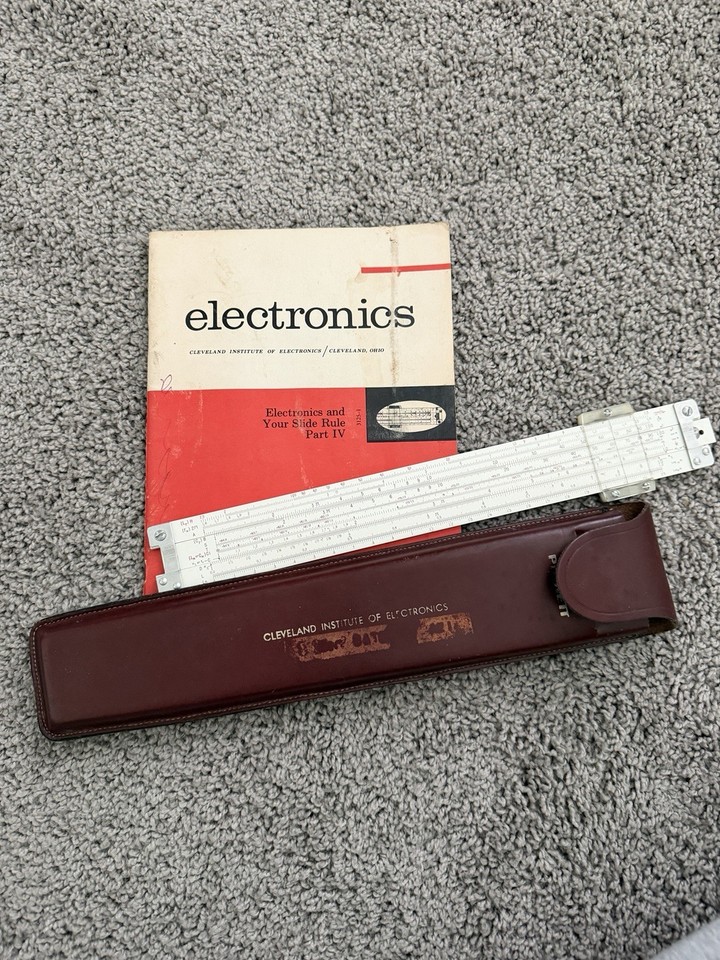 A Pickett N-515-T Electronic Duplex slide rule with leather case — specifically designed for electronics engineers and a favorite of Apollo-program types.