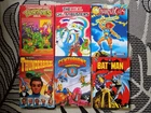 6 vintage annuals Ghostbusters Thundercats Batman TMNT Thunderbirds