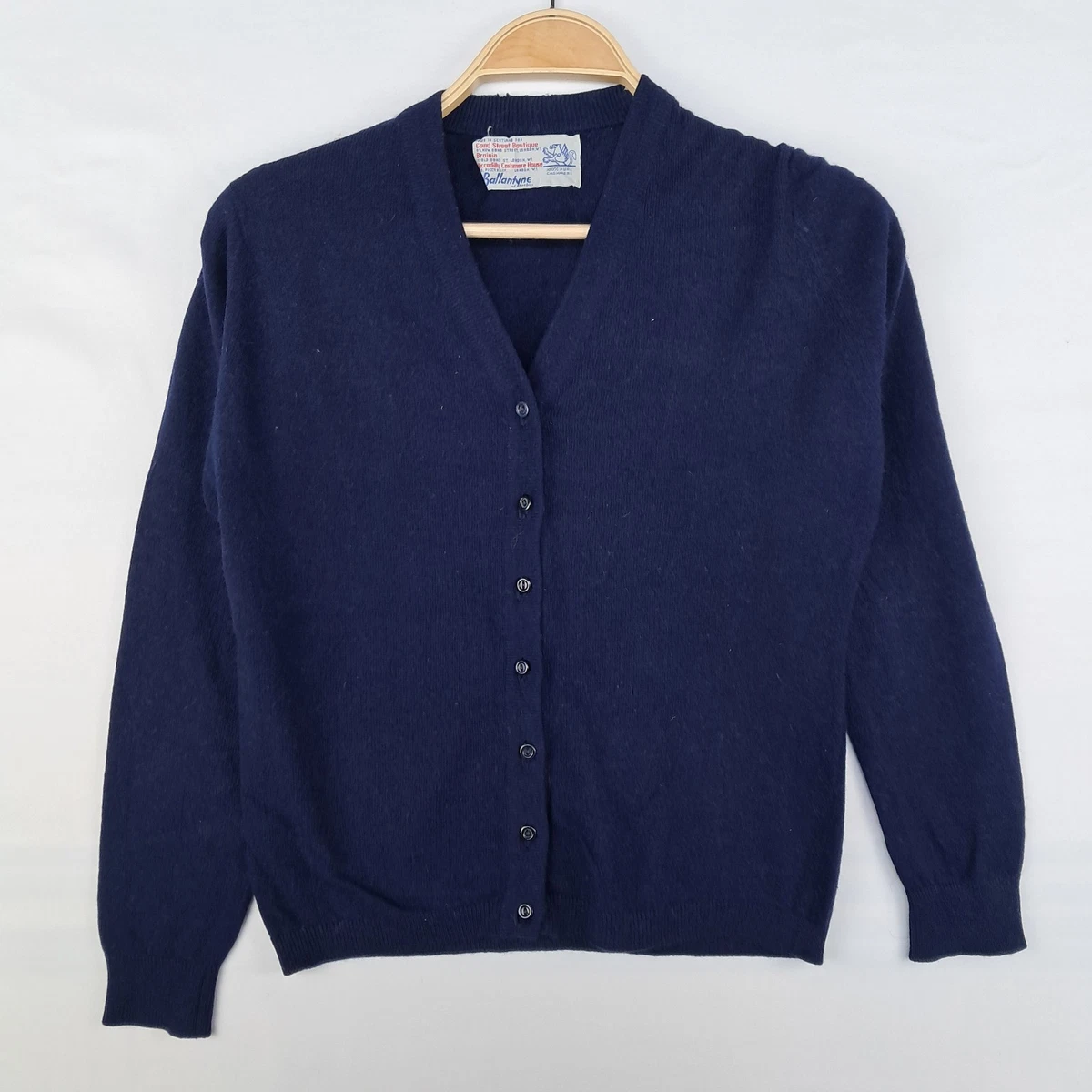 Maglione polo in cashmere blu scuro con applicazione