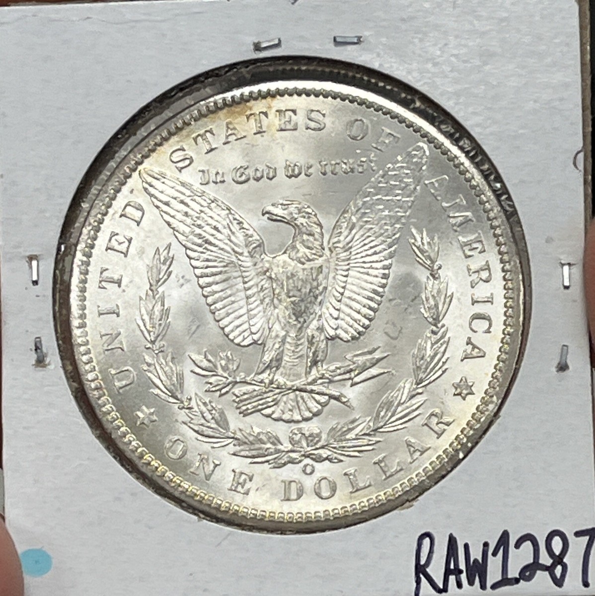 1899-O $1 Morgan Silver Dollar With Nice Color MS ( RAW1287