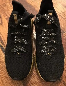 puma black team gold