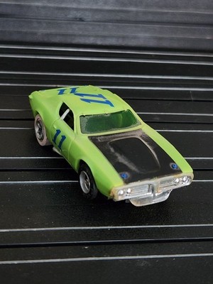 Aurora AFX #11 Dodge Charger Stock Car Magnatraction Lime Green HO
