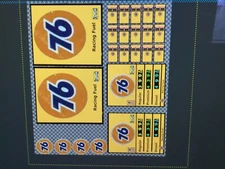 O scale gas signs &on self adhesive paper. 2 pages. 76 & Shell & Studebaker.