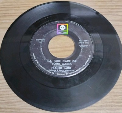 FRANKIE LAINE-EVERY STREETS A BOULEVARD/I'LL TAKE CARE OF YOUR CARES VINYL 45