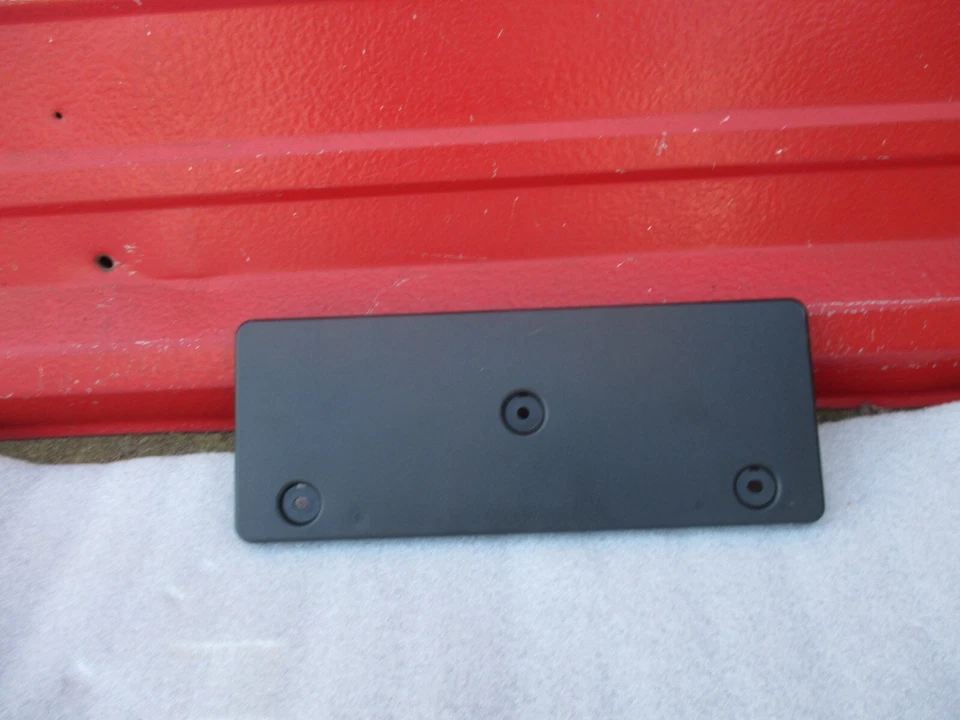 HYUNDAI TUCSON PLACA MARCO SOPORTE CUBIERTA MOLDEADO OEM 2022 - 2024 Foto 2 de 4