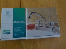 Peerless Model P299232, a two-handle laundry and utility sink faucet in a chrom