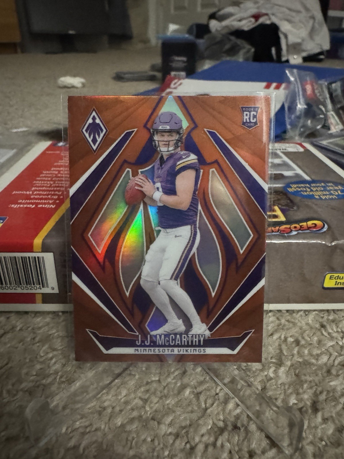 2024 Panini Phoenix - Rookies J.J. McCarthy #185 Orange (RC)