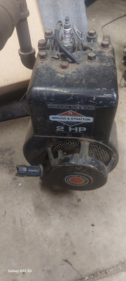 #ad 2hp briggs and stratton engine Long Block With Recoil and Shroud Muffler. $75.00