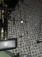 tomkat bowtech compound bow with aftermarket scope