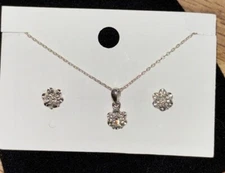 1/15 CT. T.W. Diamond Flower Stud Earrings and Necklace in Sterling Silver