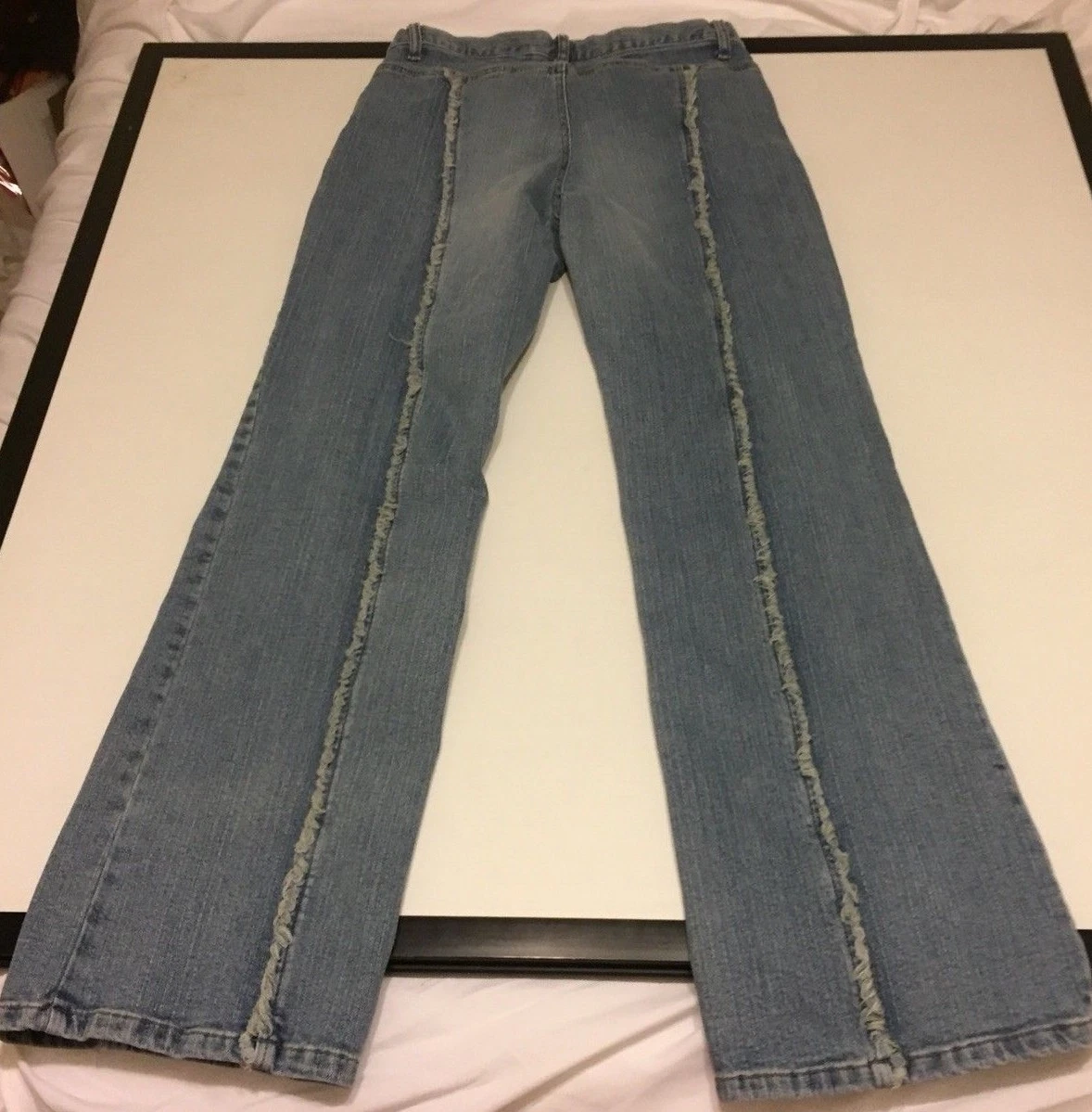 Express fringe jeans sales