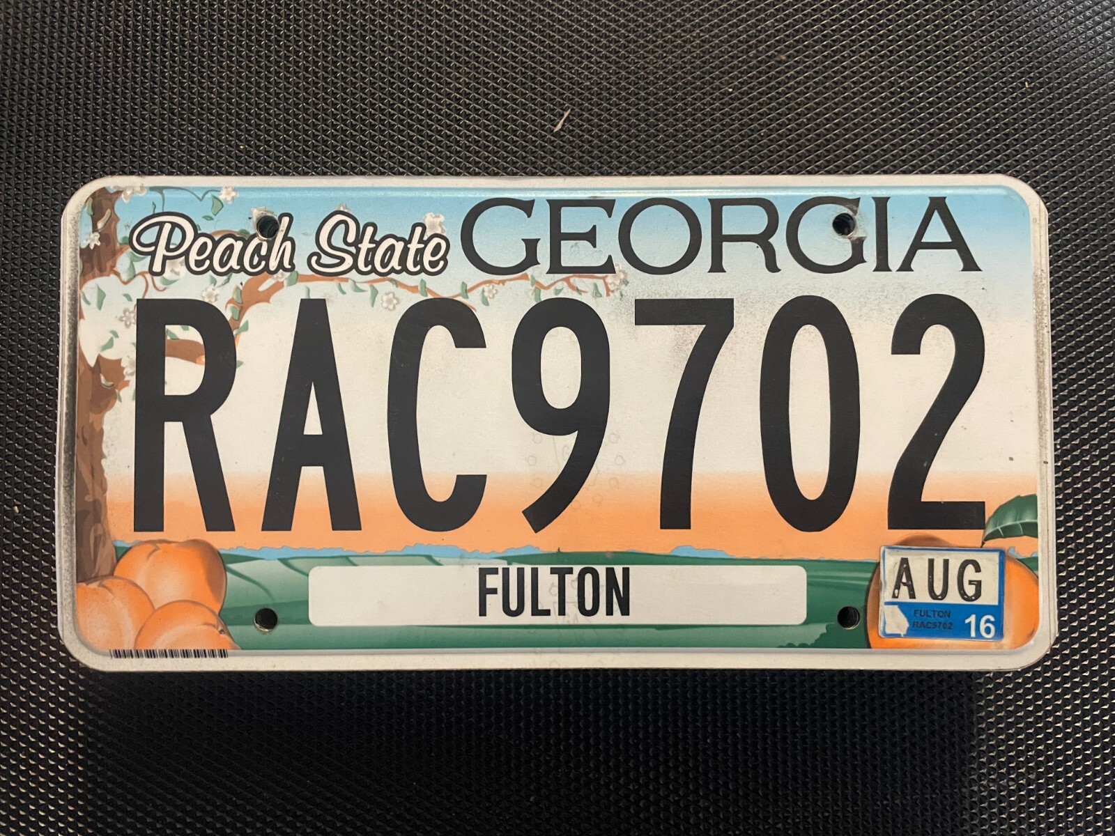 LICENSE PLATE FULTON COUNTY PEACH STATE RAC9702 RAC 9702 AUGUST