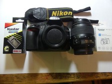 Nikon D D3100 14.2MP. Shutter count is 9083. w/ Nikon 18-55mm lens. works great.