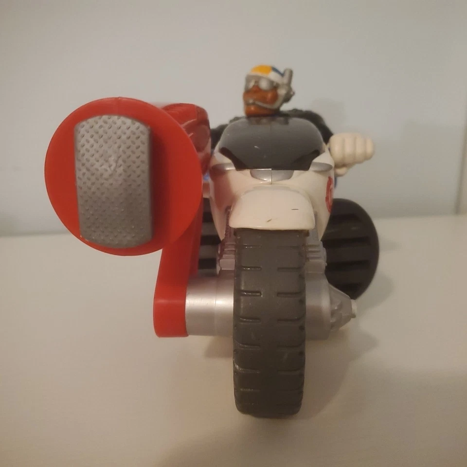 Figura de acción Fisher Price Rescue Heroes Jake Justice 1998 bicicleta de policía de colección Foto 3 de 4