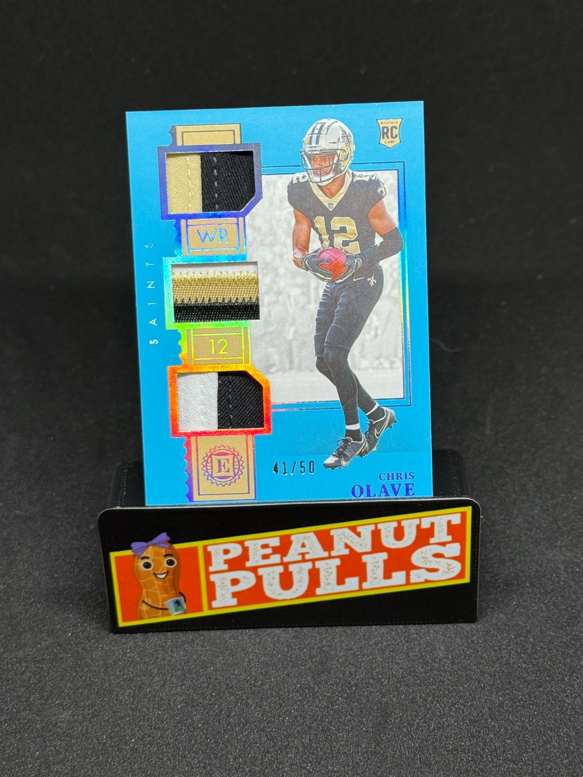 Chris Olave Panini Encased Rookie Triple Memorabilia #RTM9 Sapphire