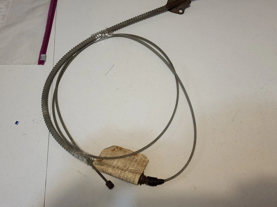 Pontiac GTO 1963-64 NOS GM de colección original cable de freno de estacionamiento pieza casi nueva # 9771225  Foto 3 de 4