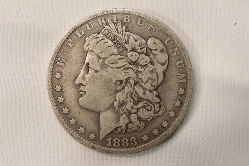 NobleSpirit (ST) 1883 O Morgan Silver Dollar VG / Fine