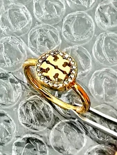 NEW TORY BURCH FROZEN LOGO RINGS IN GOLD COLO SZ 7