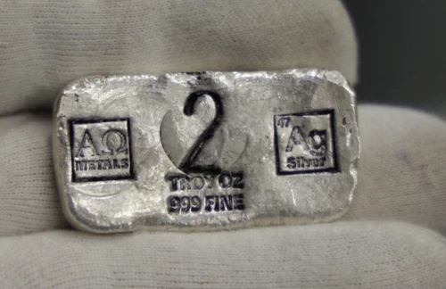 A Omega Sign 2 oz .999 Poured Silver Bar