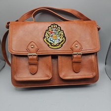 This is a Primark Harry Potter Hogwarts brown faux leather satchel bag NWT