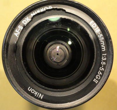 NIKON DX SWM ED ASPHERICAL 0.28M/0.92FT 52 US 6766543 18-55 MM 1