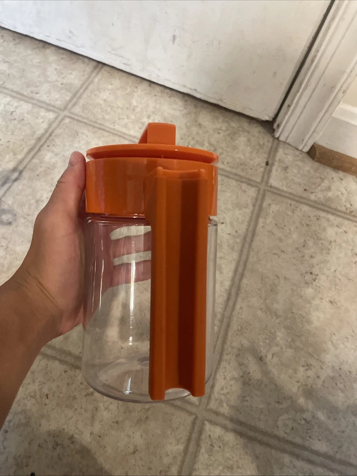 Exprimidor para hacer jugos de naranja Takeya plástico naranja escariador contenedor de plástico transparente Foto 2 de 4
