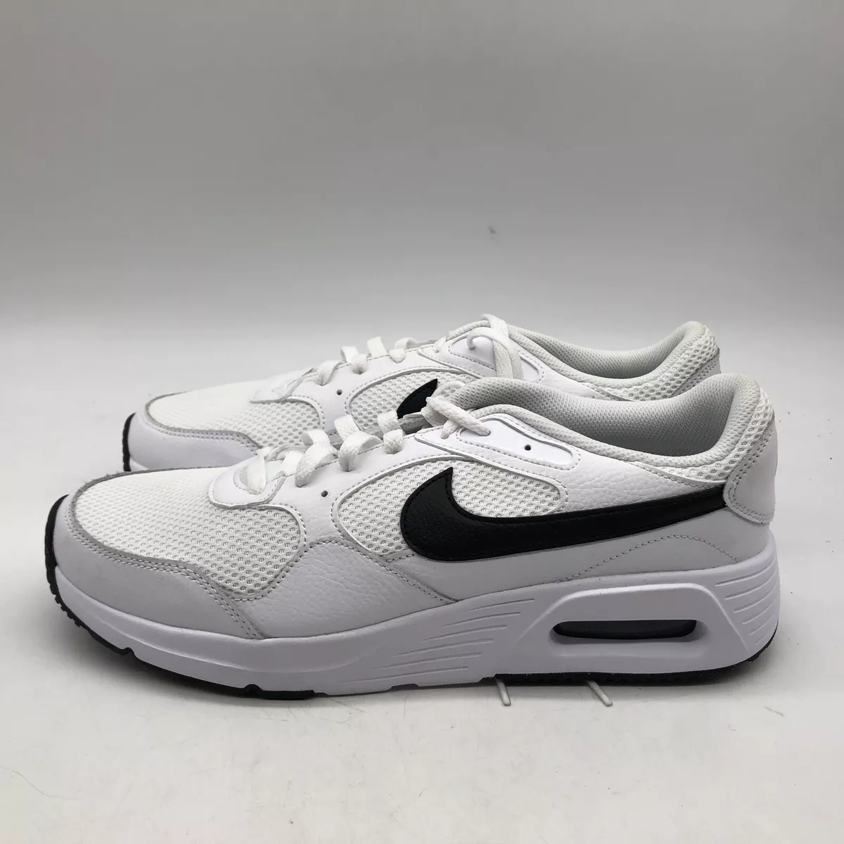 White nike air max trainers with black tick cheap