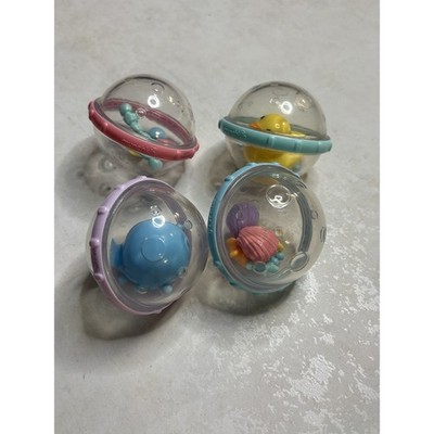 Munchkin Float and Play Bubbles Bath Toy Set of 4 Rattle Sensory Balls Multi