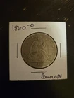 1860-o seated liberty dollar