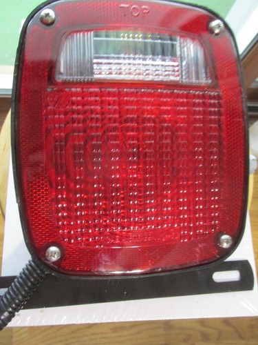 MOPAR DRIVER LH BRAKE TAIL TURN REVERSE SIDE 3 LIGHT WITH PIGTAIL WIRING BRACKET - Picture 3 of 22