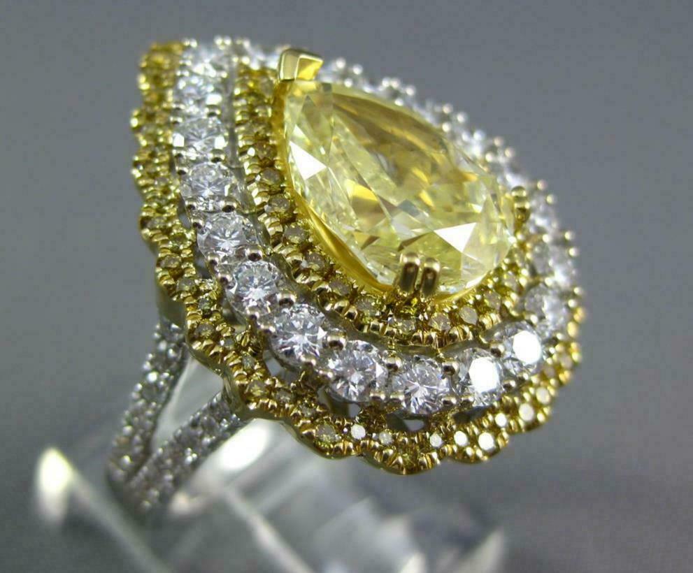 LARGE WHITE FANCY YELLOW DIAMOND 18KT GOLD PEAR SHAPE