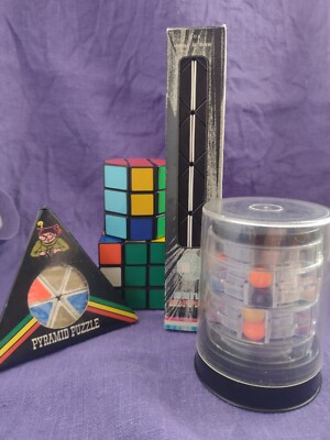Konvolut Original Rubiks Würfel, Pyramide, Schlange, Oktagonus, 10 Milliarden Fass B7