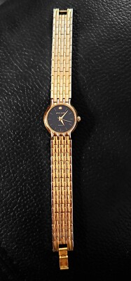 pierre cardin ゴールドアナログ時計 Vintage Pierre Cardin Watch Gold Tone Black Round Dial