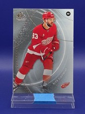 Alex DeBrincat 2025-26 UD SP Game Used Base 🔥 Red Wings