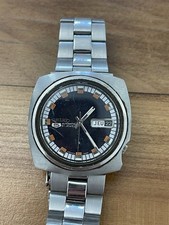 Montre Seiko guichet jour/date