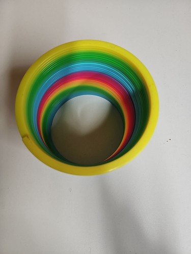 Slinky Rainbow Colored Jumbo 5" Colorful Plastic Very Good used Condition - Picture 3 of 8