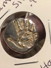 6.1 Grams .999 Silver Handpoured .skull In Hand